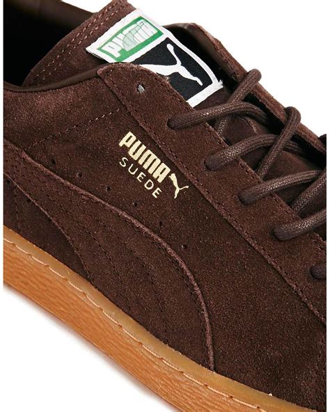 brown puma sneakers for men.